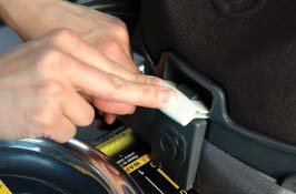 If the vehicle seat back is adjustable, lock the vehicle seat back into the upright position.
