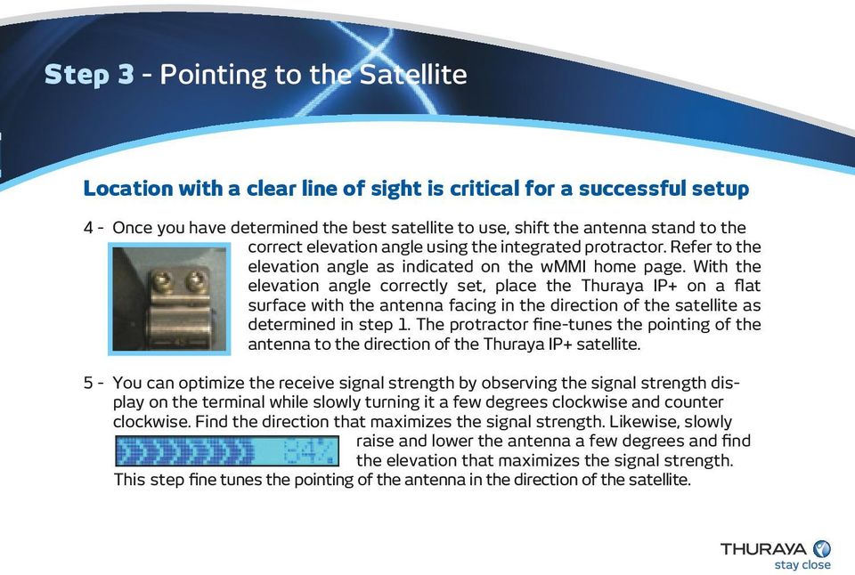 With the elevation angle correctly set, place the Thuraya IP+ on a flat surface with the antenna facing in the direction of the satellite as determined in step 1.
