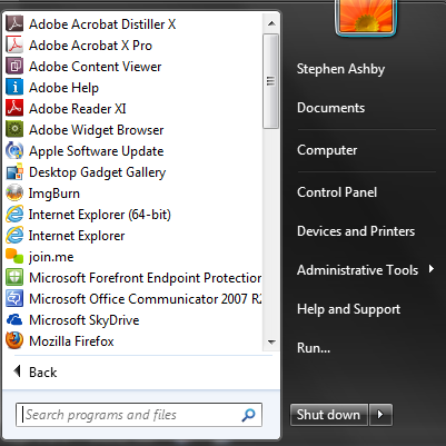 The Start Menu pops up with a two column layout. On the left side are for program shortcuts and the right side are for folders and computer management.