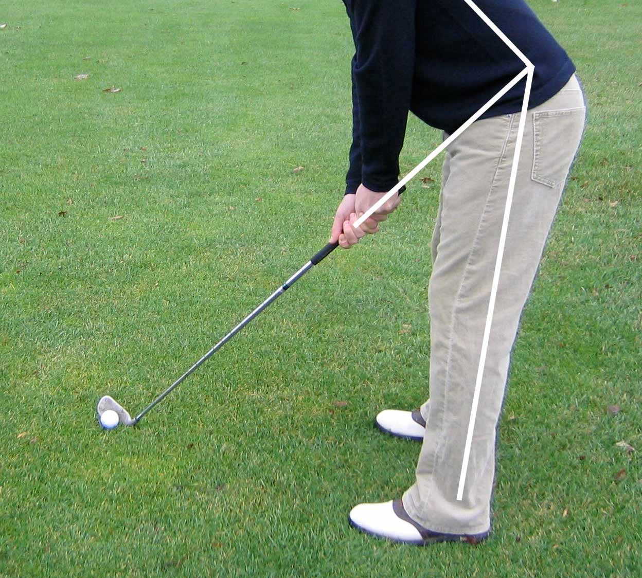 The back is still straight. All you need to do is bend at the waist until the club touches the ground.