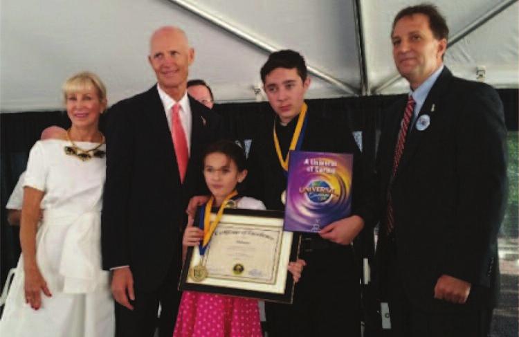 Her brother, now 14, was also honored for his role in the events of that terrible day.