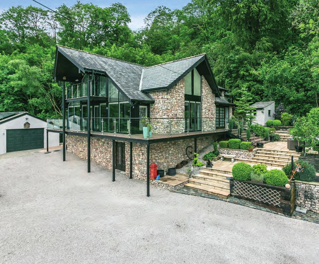 Set within an Area of Outstanding Natural Beauty, enjoying an elevated position with stunning panoramic views to the Yorkshire Dales, Lune Valley and beyond, this striking architect designed home
