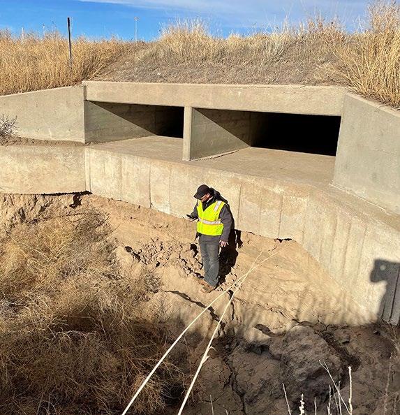1 2 Erosion repair 1. A location near U.S. 50 in Finney County had major erosion that could have impacted the stability of the box culvert and the downstream area. 2. In late December, the Garden City Subarea crew worked to grade, make repairs and place rock throughout the area.
