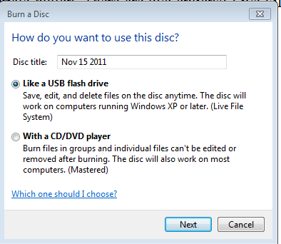 4. The Burn a Disc dialog box opens. Select the method you wish to use by clicking the appropriate button. There are two options: Live File System or Mastered.
