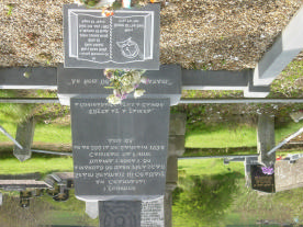 [Translation: In memory of Commandant John James Kelly who died due to an exploding bomb in Castlefinn on the 28th of November.1938, age 48. Erected by his relatives, comrades and friends.