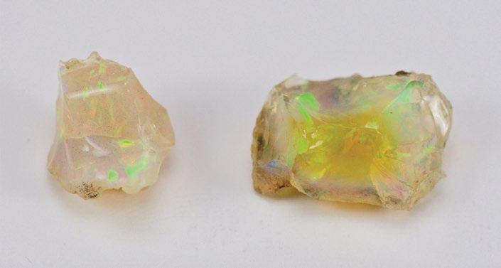 Top: Two of the three White-based polished Ethiopian hydrophane opals being fully saturated with red wine (left) and coffee (right).