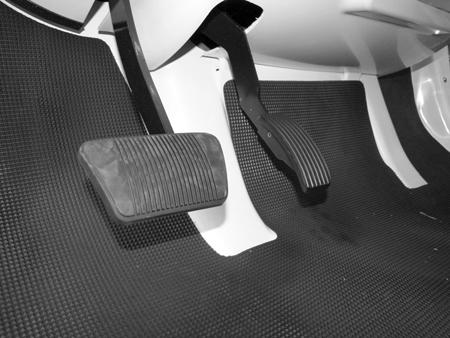 Electrical ACCELERATOR PEDAL DESCRIPTION The accelerator pedal is located on the floor, close to the center of the vehicle and is used to control vehicle speed.