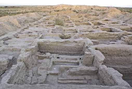ARCHAEOLOGICAL EXPEDITIONS ARCHAEOLOGICAL EXPEDITIONS Khumcha vessel with a sixth- to seventh-century Sogdian inscription Shahristan I. West aspect.
