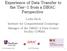 Experience of Data Transfer to the Tier-1 from a DIRAC Perspective