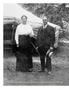 T. K. and Mary Leonard standing outside while attending a camp meeting at Media, Pennsylvania, circa 1920.